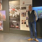 Peter in front of some of his exhibition